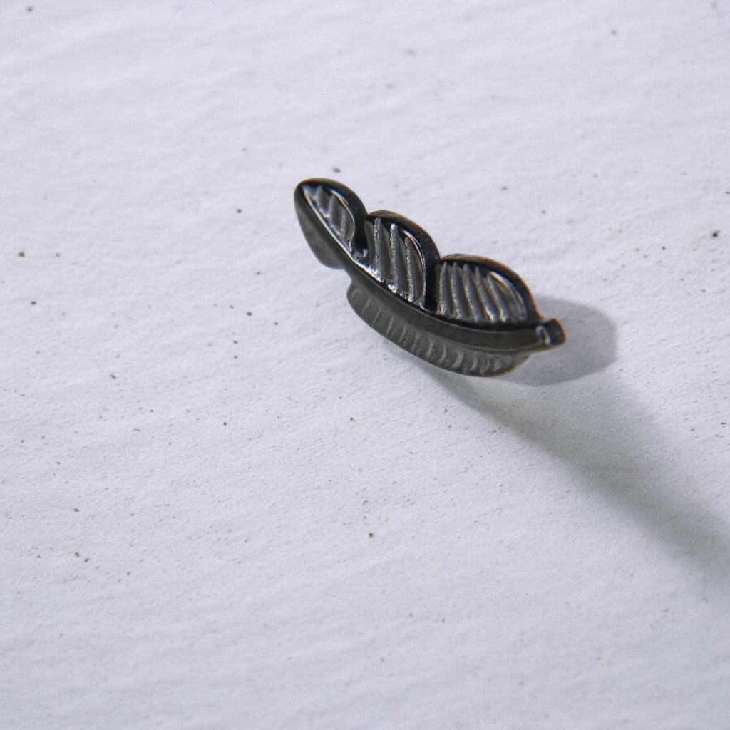 LABRET PLUMA