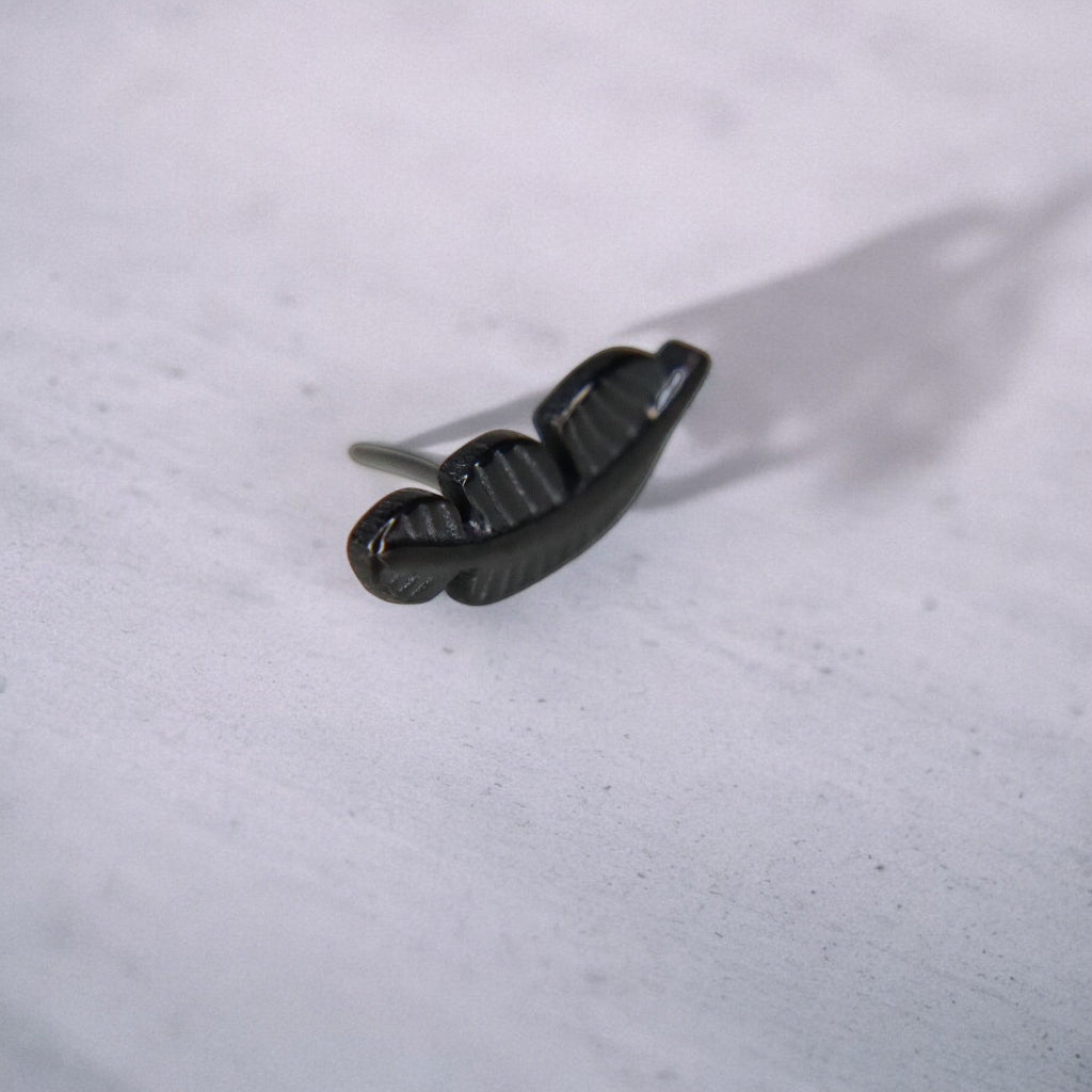 LABRET PLUMA